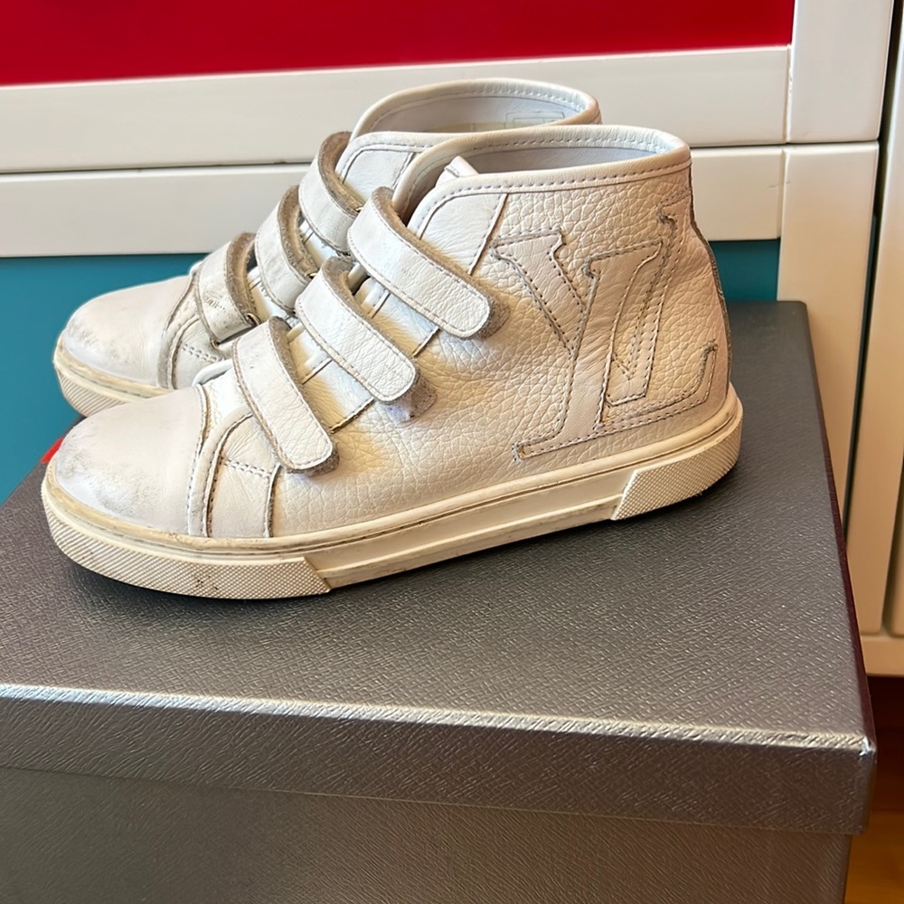White Louis Vuitton high top sneaker